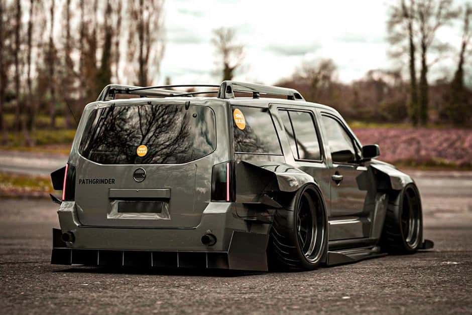 The old modified Nissan Pathfinder has a wide and exotic bodywork